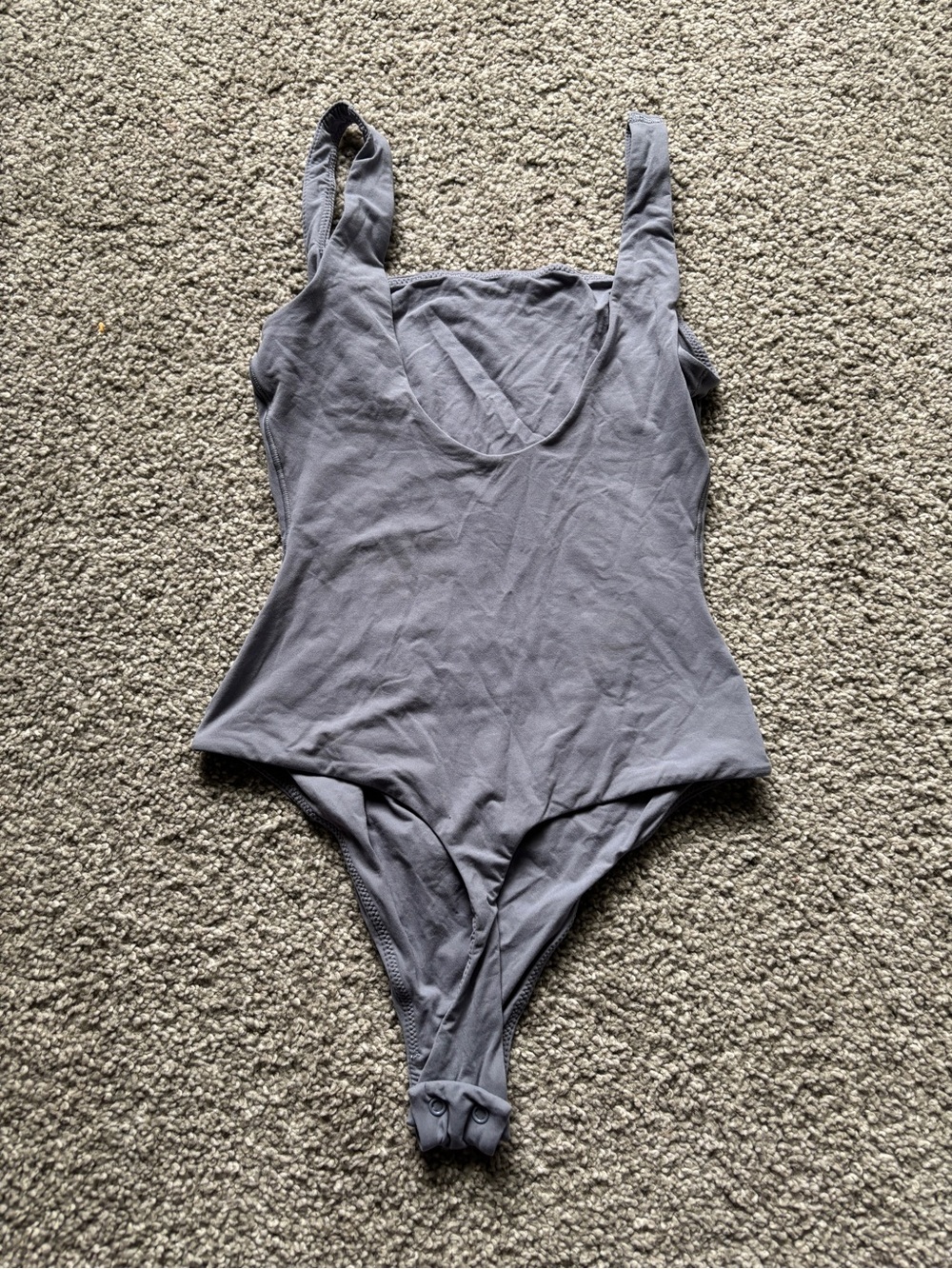 Grey body suit